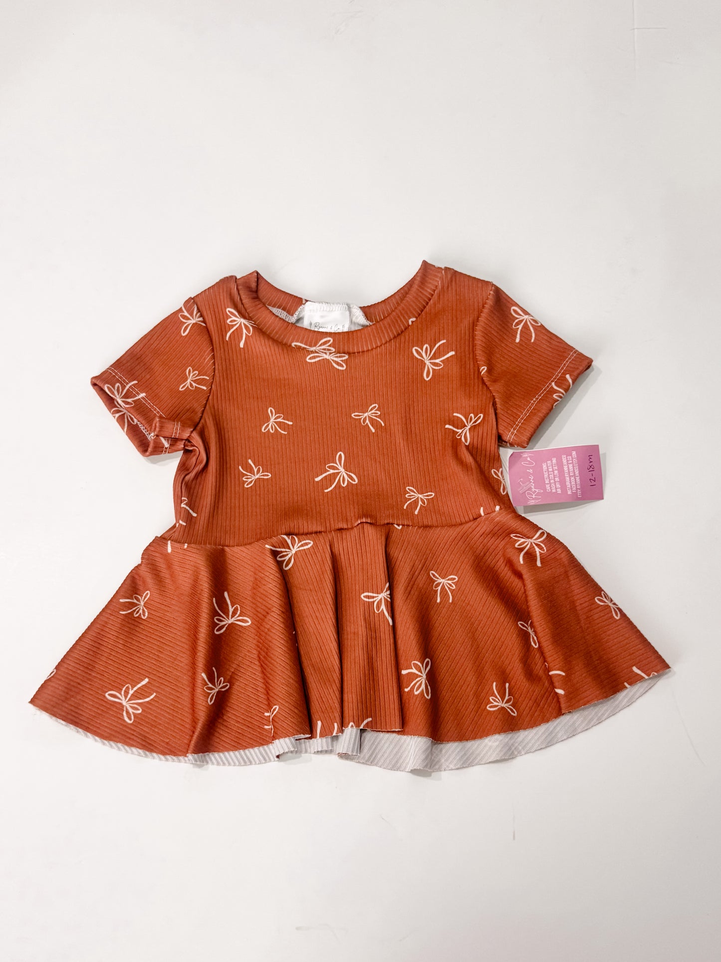 12-18m Bow Peplum